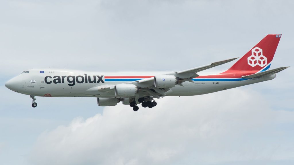 Cargolux Boeing 747 cargo airplane flying against a cloudy sky. — 747 Live