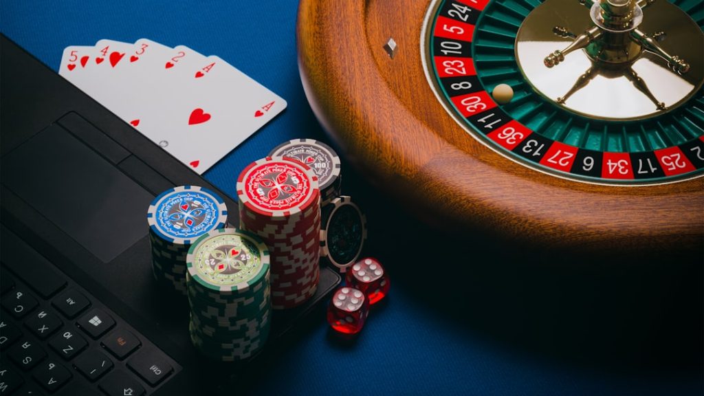 Playing cards on brown wooden table — 747.live Casino