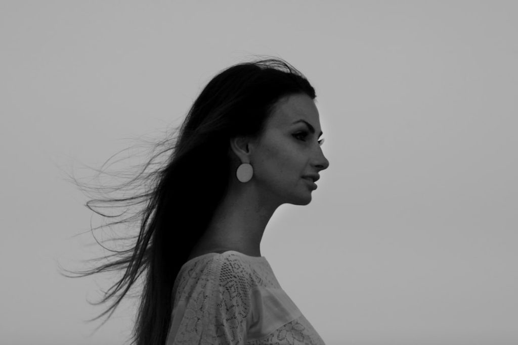 A black and white photo of a woman with long hair — Julia.ostan