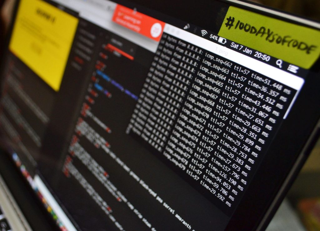 Macro shot of a laptop displaying coding and data analysis in progress. Ideal for tech themes. — Kaplog