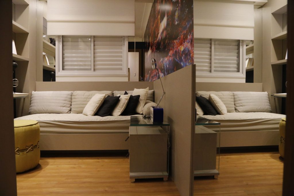 Stylish bedroom interior featuring cozy furniture and mirror reflection. — Lpb Piso Wifi