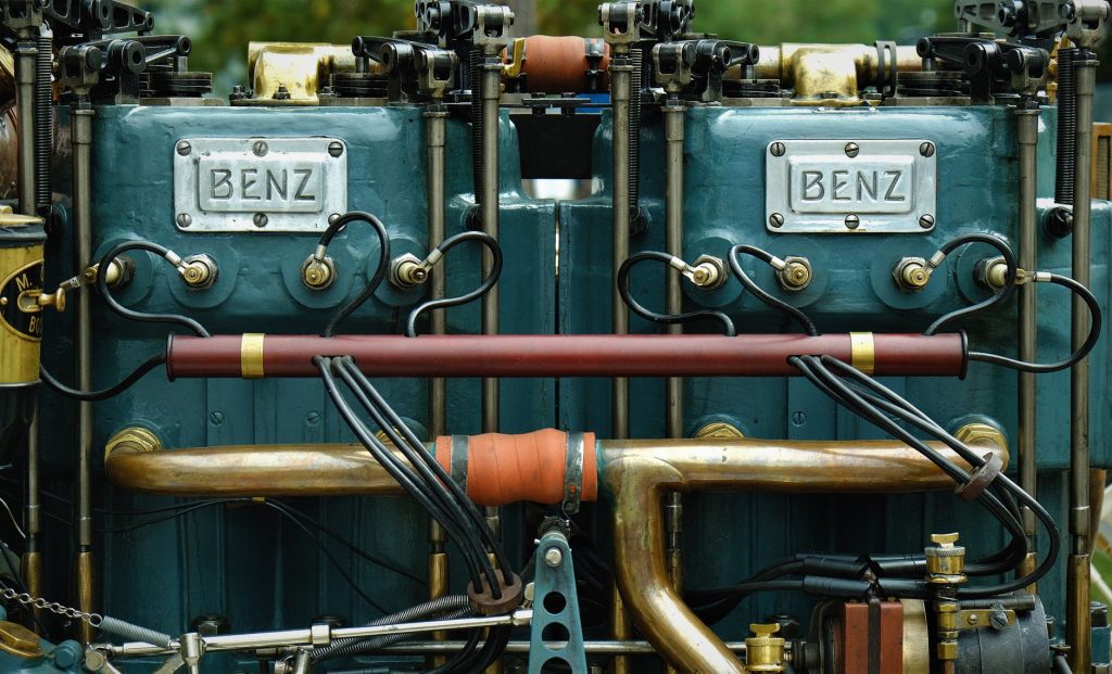 Intricate vintage Benz engine parts with industrial design in focus. — Mbc2035